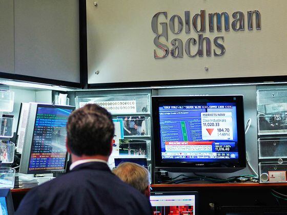CDCROP: Financial professionals sit in the Goldman Sachs booth on the floor of the New York Stock Exchange (Chris Hondros/Getty Images)