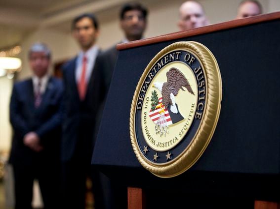 NEW YORK, NY - DECEMBER 11: A US Department of Justice seal is displayed on a podium during a news conference to announce money laundering charges against HSBC on December 11, 2012 in the Brooklyn borough of New York City. (Photo by Ramin Talaie/Getty Images)