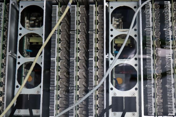Bitcoin mining ASICs submerged in immersion cooling liquid at a facility in southern Spain. (Eliza Gkritsi)