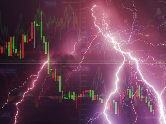 CDCROP: Stock charts against the sky with lightning. World financial crisis concept (Getty Images)
