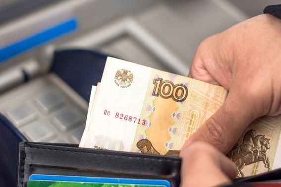 Withdrawing rubles at a Russian ATM.(Credit: Shutterstock/Iana Alter)
