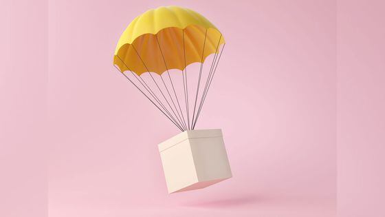 yellow parachute delivering a package. 3d illustration (Getty Images)