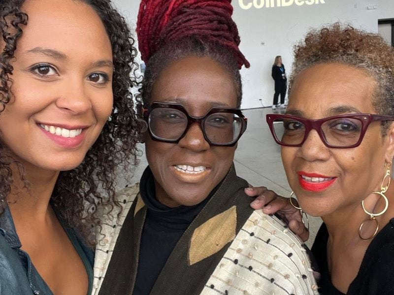 Three members of the founding EVOLVE team and Disruptor DAO, at CoinDesk's I.D.E.A.S. conference. From left to right: Olivia Drouhaut, Zawadi Vanessa Fulston-Thomas and Sheila Ruiz.
