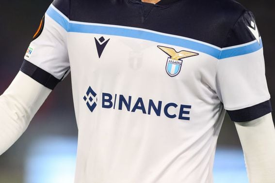 ROME, ITALY - OCTOBER 21: Details on the SS Lazio jersey showing the new sponsor Binance during the UEFA Europa League group E match between SS Lazio and Olympique Marseille at Olimpico Stadium on October 21, 2021 in Rome, Italy. (Photo by Jonathan Moscrop/Getty Images)