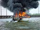 Burning boat (TerryHealy / Gettyimages)