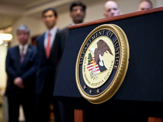 NEW YORK, NY - DECEMBER 11: A US Department of Justice seal is displayed on a podium during a news conference to announce money laundering charges against HSBC on December 11, 2012 in the Brooklyn borough of New York City. (Photo by Ramin Talaie/Getty Images)