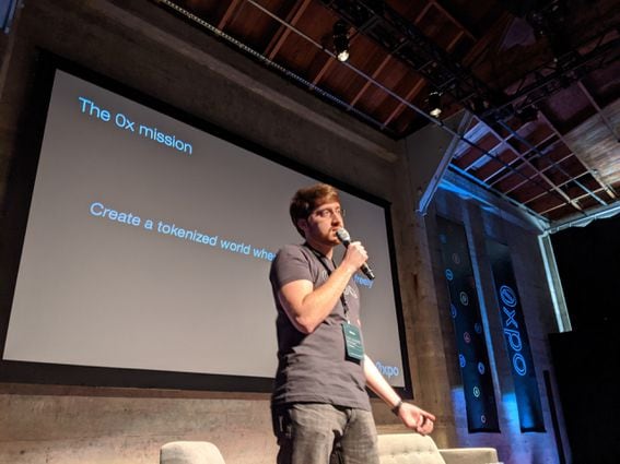 TOKEN CLARITY? Amir Bandeali, co-founder of 0x, speaks at the first 0xpo conference, one day after SEC Commissioner Hester Peirce dropped a proposed "safe harbor" for token projects. (Photo by Will Foxley for CoinDesk)