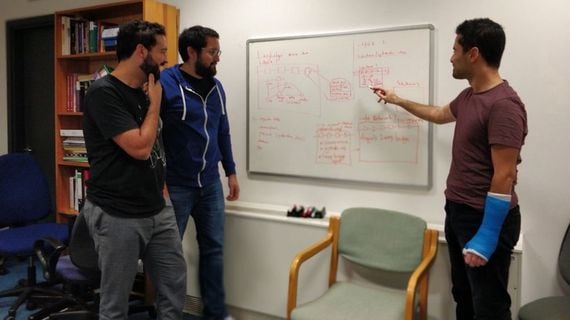 According to the Celestia Foundation, this photo was taken shortly after Celestia CEO Mustafa Al-Bassam (then a Ph.D. student) published the "LazyLedger" research paper in 2019. Al-Bassam is on the right, with Celestia executives Ismail Khoffi (left) and John Adler (center). (Celestia Foundation)
