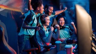 Gamers celebrating success (Getty Images)