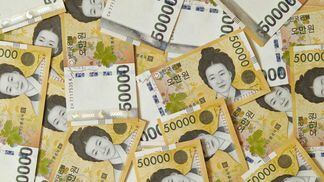 A scattering of 50,000 South Korean-won notes