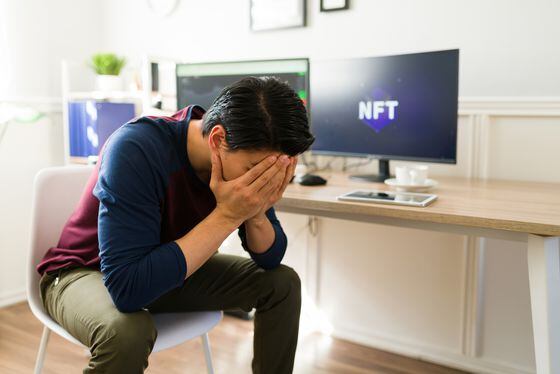 Sad NFT trader (Getty Images)