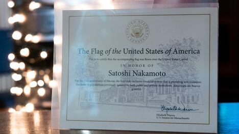 U.S. Senator Elizabeth Warren's signature on the Satoshi Nakamoto flag certificate that was flown over the United States Capitol was displayed at PubKey on Feb. 15. (	Steven Ferdman/Getty Images)