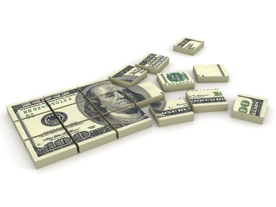 CDCROP: Illustration of a stack of $100 bills broken in squares (Getty Images)