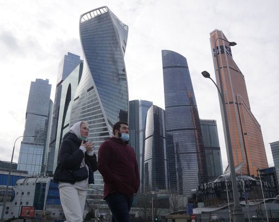Pedestrians outside the Moscow City business district, where Suez is headquartered (Mikhail Svetlov/Getty Images)