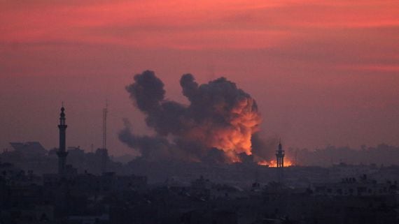 Israeli forces bombard Gaza City, Gaza, in response to attacks from Hamas, whose cryptocurrency backing may lend energy to U.S. Sen. Elizabeth Warren's effort to combat crypto money laundering. (Ahmad Hasaballah/Getty Images)