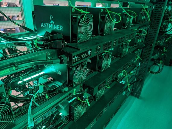 Antminer bitcoin mining rigs displayed at Consensus 2021 (Christie Harkin/CoinDesk)