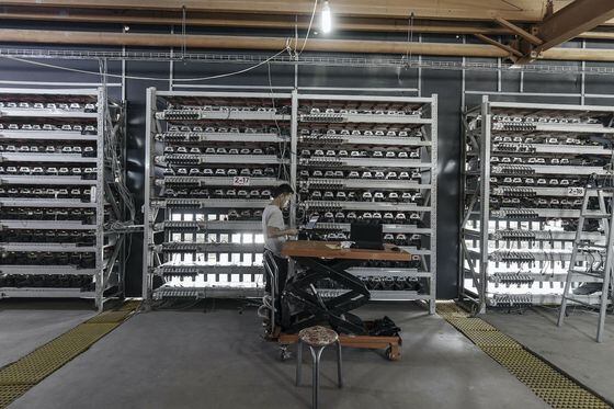 bitcoin mining machines at a mining facility operated by Bitmain Technologies Ltd. in Ordos, Inner Mongolia