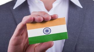 Man with Indian flag on card
