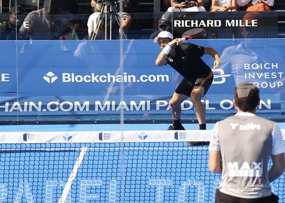 MIAMI, FLORIDA - FEBRUARY 27:  Lucas Campagnolo and Javier Garrido Gomez play Arturo Coello Manso and Fernando Belasteguin in the finals at Blockchain.com Miami Padel Open Finals presented by Richard Mille at Island Gardens on February 27, 2022 in Miami, Florida. (Photo by John Parra/Getty Images for Blockchain.com Miami Padel Open )