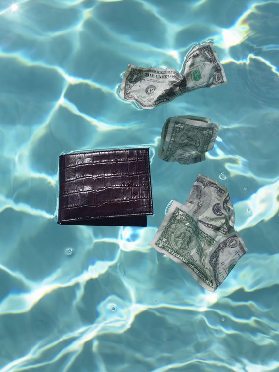 Wallet in a pool (Getty)