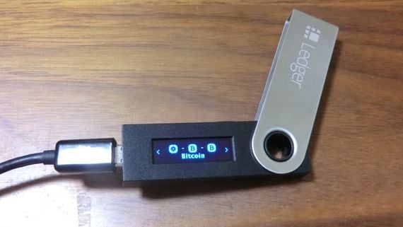 Ledger Nano S hard wallet opened to show the screen display