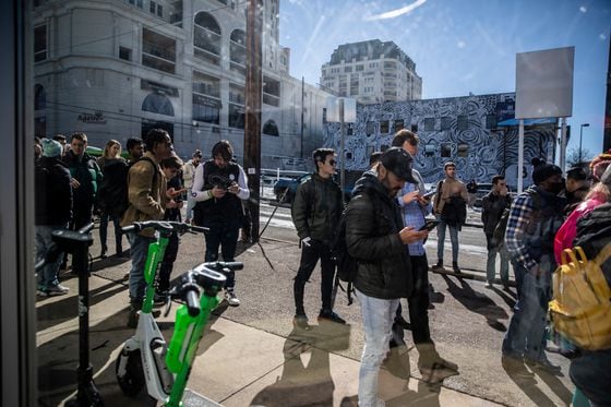 ETHDenver attendees wait in line to enter the venue. (Chet Strange/Bloomberg via Getty Images)