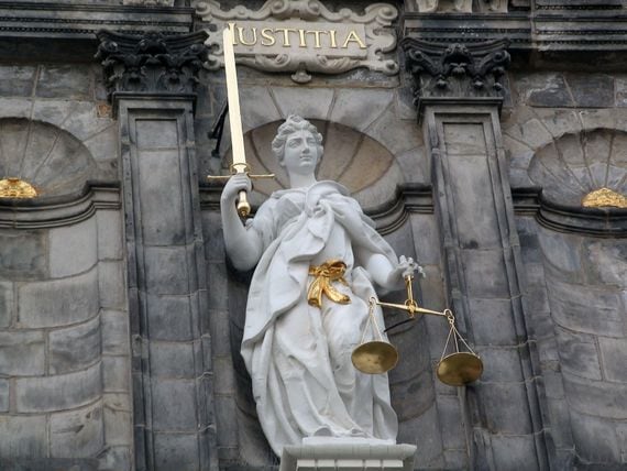 symbol-of-justice-statue-on-delfts-town-hall-south-holland