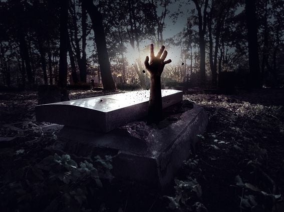 CDCROP: Hand rising out from the grave (Getty Images)