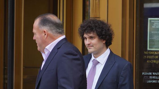 Sam Bankman-Fried (right) exits a Manhattan courtroom on July 26, 2023. (Nikhilesh De/CoinDesk)