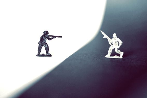 toy soldiers (Sahand Babali/Unsplash, modified by CoinDesk)