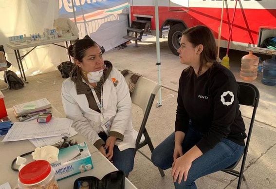 Emerge CEO Lucia Gallardo working with migrants in Mexico in 2018. (Credit: Emerge)