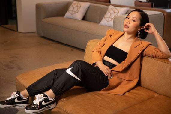 Michelle Phan poses in the Em Cosmetics office. (Photo by Mark Sacro for CoinDesk)