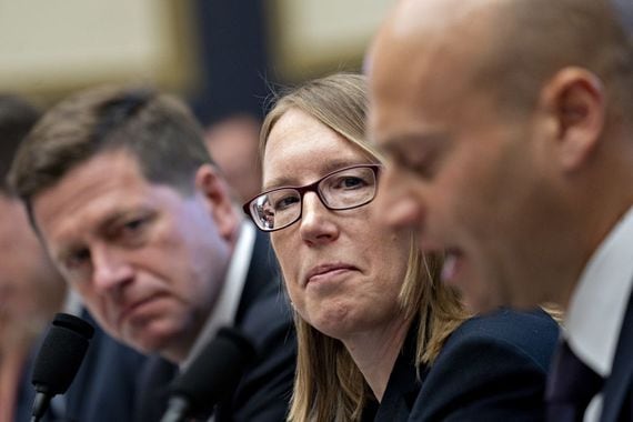 Hester Peirce, commissioner of the U.S. Securities and Exchange Commission (SEC), center, listens during a House Financial Services Committee hearing in Washington, D.C., U.S., on Tuesday, Sept. 24, 2019. The head of the SEC said this month his agency and other regulators are keeping taps on emerging risks in the fast-growing corporate debt market, highlighting assets that could he susceptible to liquidity shocks. Photographer: Andrew Harrer/Bloomberg via Getty Images
