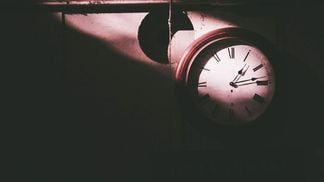 CDCROP: Clock in Shadow (Sikranta H. U./Unsplash)