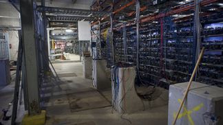 Bitcoin mining machines in a former steel mill in the midwest.