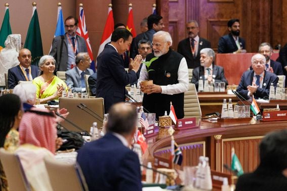 Joko Widodo President of Indonesia presents Prime Minister Narendra Modi of India a tree sapling at the G20 on September 10, 2023 (Dan Kitwood/Getty Images).
