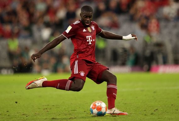 MUNICH, GERMANY - OCTOBER 03: Dayot Upamecano of FC Bayern Muenchen passes the ball during the Bundesliga match between FC Bayern München and Eintracht Frankfurt at Allianz Arena on October 03, 2021 in Munich, Germany. (Photo by Adam Pretty/Getty Images)