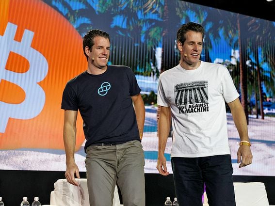 MIAMI, FLORIDA - JUNE 04:  Tyler Winklevoss and Cameron Winklevoss (L-R), creators of crypto exchange Gemini Trust Co. on stage at the Bitcoin 2021 Convention, a crypto-currency conference held at the Mana Convention Center in Wynwood on June 04, 2021 in Miami, Florida. The crypto conference is expected to draw 50,000 people and runs from Friday, June 4 through June 6th.  (Photo by Joe Raedle/Getty Images)