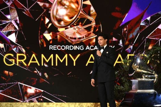LOS ANGELES, CALIFORNIA - MARCH 14: Trevor Noah speaks onstage during the 63rd Annual GRAMMY Awards at Los Angeles Convention Center on March 14, 2021 in Los Angeles, California. (Photo by Kevin Winter/Getty Images for The Recording Academy)