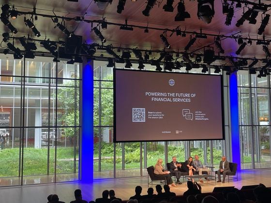 A panel on the future of financial services at the Coinbase State of Crypto Summit in New York, featuring BlackRock, Fidelity and Franklin Templeton. (CoinDesk/Eliza Gkritsi)