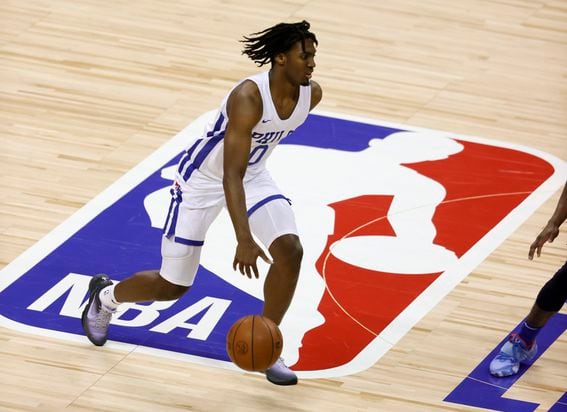 LAS VEGAS, NEVADA - AUGUST 09:  Tyrese Maxey #0 of the Philadelphia 76ers brings the ball up the court against the Dallas Mavericks during the 2021 NBA Summer League at the Thomas & Mack Center on August 9, 2021 in Las Vegas, Nevada. The 76ers defeated the Mavericks 95-73. NOTE TO USER: User expressly acknowledges and agrees that, by downloading and or using this photograph, User is consenting to the terms and conditions of the Getty Images License Agreement.