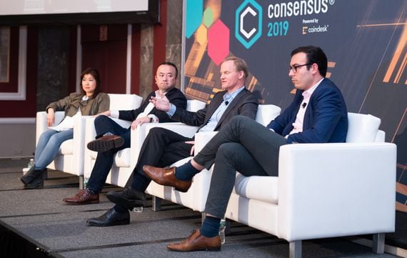 Edward Woodford, co-founder of Seed CX and Zero Hash (far right), appears on a panel at Consensus 2019.