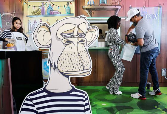 Inside the Bored Ape Yacht Club–themed pop-up burger restaurant in Long Beach, California. (Mario Tama/Getty Images)