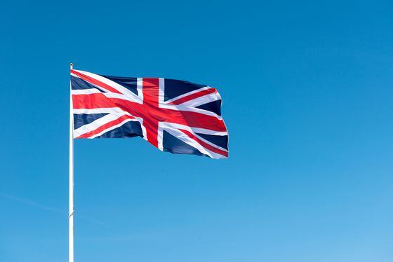 Union Jack Flag of Great Britain against a Blue Sky
