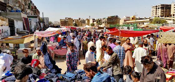 Karachi, Pakistan - Nov 14, 2021: People are seen at a weekly Sunday bazaar in Bufferzone, an area of central Karachi of Sindh province in Pakistan