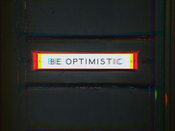 Optimistic (Unsplash modified by CoinDesk)