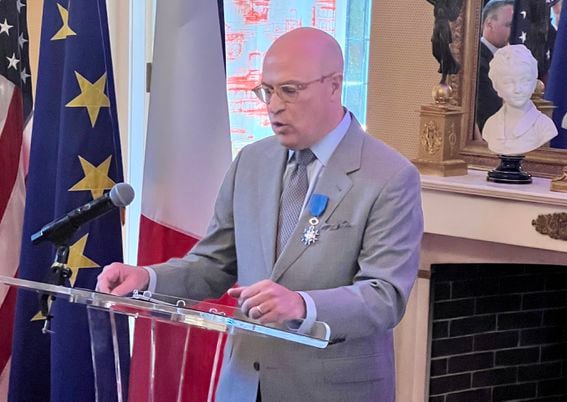 J. Christopher Giancarlo, the former chairman of the U.S. Commodity Futures Trading Commission, accepts a French knighthood (Giancarlo family)