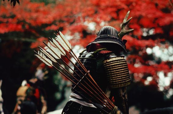 A Japanese man in circa 12th century samurai warrior clothing and carrying a quiver of arrows on his back. (Ernst Haas/Ernst Haas/Getty Images)