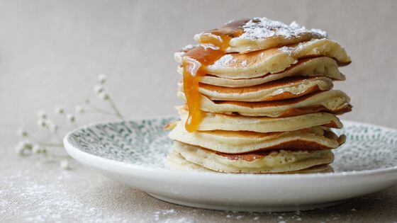 pile of pancakes on a plate.