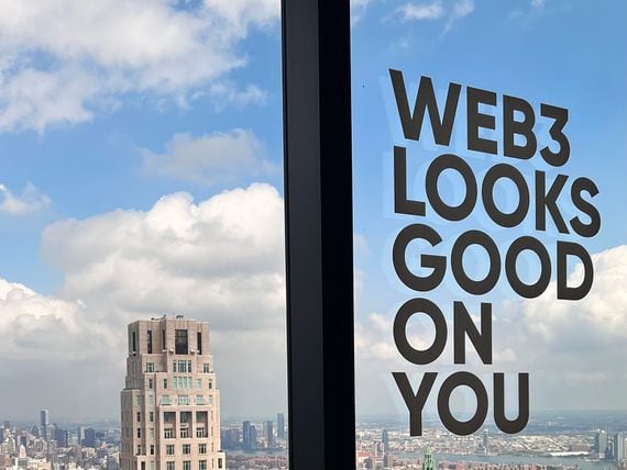 Web3 looks good on you sign window NYC (Cameron Thompson/CoinDesk)